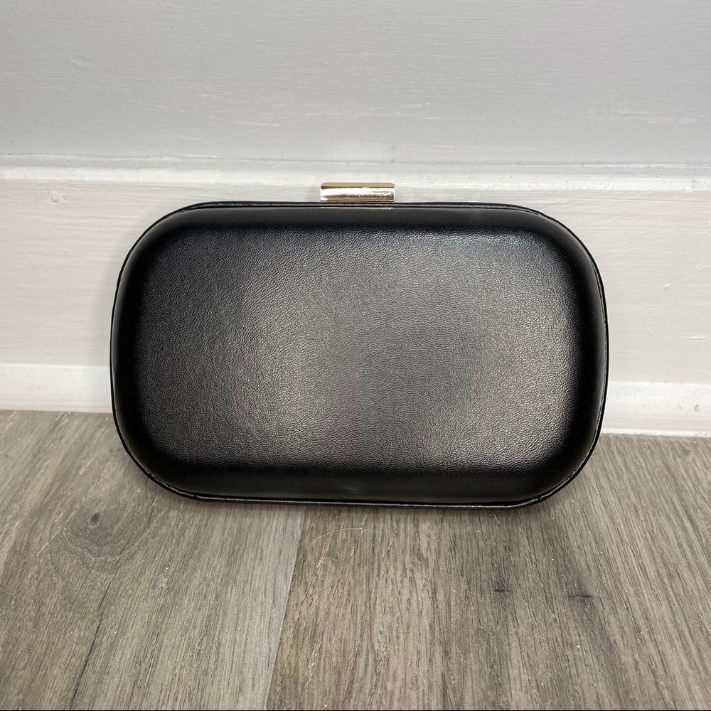 Ellie Kai hardshell clutch